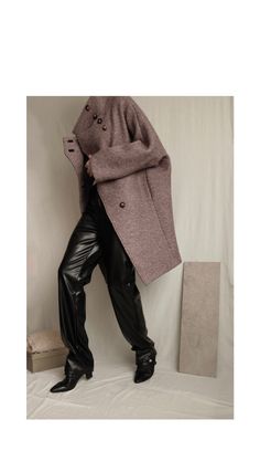 Make a bold fashion statement this winter with our oversized bouclé wool coat. This cocoon coat features a high collar, a wrap-over lapel with concealed button closure, side  seam pockets, and full lining. The kimono sleeves add a touch of elegance, while the relaxed, boxy fit ensures effortless layering. Stay warm and stylish all season long.  ⏀While it supports beautifully the boxy silhouette of this coat, bouclé wool can be quite stiff to the touch. ⏀Crafted with 3 yards of fabric, this coat Oversized Brown Turtleneck Outerwear, Chic Oversized Structured Wool Coat, Elegant Oversized Turtleneck Outerwear, Chic Oversized Turtleneck Outerwear, Chic Oversized Wool Coat With Button Closure, Oversized Structured Wool Coat For Winter, Oversized Chic Wool Sweater Coat, Chic Oversized Wool Sweater Coat, Cocoon Coat