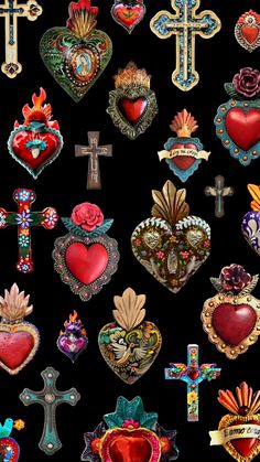 an assortment of heart shaped brooches with crosses and hearts on them, all in different colors