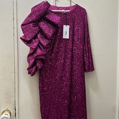 Fuchsia New Dress Never Used Perfect For Wedding Or Party Glamorous Pink Midi Dress For Wedding Guest, Elegant Purple Party Dress, Elegant Purple Dress For Party, Chic Purple Party Dress, Purple Cocktail Dress For Holiday, Purple Spring Cocktail Evening Dress, Purple Cocktail Evening Dress For Spring, Spring Cocktail Purple Evening Dress, Holiday Purple Sequin Dress