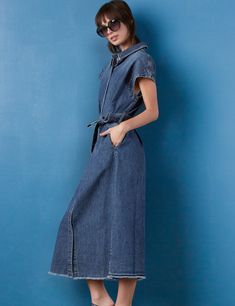 The Weekend Denim Midi Dress is always ready for fun, with it's adorable cropped sleeves, tie-waist, and frayed hem detail. The cover model is 5'7" wearing size small Fabric: 100% Cotton Length: 48 1/2" from shoulder to longest point Spring Short Sleeve Belted Denim Dress, Indigo Denim Short Sleeve Dress With Pockets, Indigo Denim Dress With Pockets And Short Sleeves, Summer Short Sleeve Belted Denim Dress, Summer Denim Dress With Belt And Short Sleeves, Casual Belted Short Sleeve Denim Dress, Casual Belted Denim Dress With Short Sleeves, Casual Short Sleeve Denim Dress With Belt, Casual Short Sleeve Belted Denim Dress