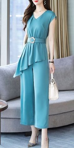 Blue turquoise elegant classy chic dressy jumpsuit for women sleeveless with waist belt. Unique fashion formal design to raise your elegance. Chic Light Blue Sleeveless Jumpsuits And Rompers, Elegant Solid Color One-piece Jumpsuit, Elegant Solid Color One-piece Jumpsuit Or Romper, Elegant Solid Color One-piece Jumpsuits And Rompers, Elegant One-piece Jumpsuits And Rompers In Solid Color, Elegant Blue Sleeveless Jumpsuits And Rompers, Elegant Solid Color Jumpsuits And Rompers For Spring, Elegant One-piece Jumpsuit For Work, Elegant One-piece Jumpsuits And Rompers For Work