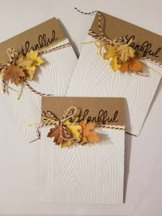 three cards with autumn leaves on them and the words hello fall written in black ink