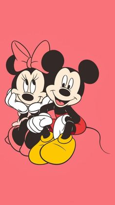 two mickey and minnie mouses hugging each other on a pink background with the words disney written