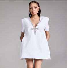 Nwt Size Medium Elegant White Mini Dress For Evening, White A-line Cocktail Dress, Luxury V-neck Midi Dress For Summer, Elegant White Backless Mini Dress, Glamorous White A-line Mini Dress, White Dressy Mini Dress For Evening, Luxury White A-line Dress, White Evening Mini Dress, Chic White Mini Dress For Evening