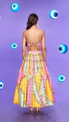 A tri-color paneled half lehenga embellished in pink, yellow, and mint raw silk, embroidered with glass stones, metal pieces, and glass cut beads. Paired with an original Papa Don't Preach pink butterfly blouse with 3D embroidery.From Papa Don’t Preach’s Nazar Na Lage collection. DELIVERY TIMEPlease allow 8-12 weeks for your outfit to arrive. FABRIC DETAILSRaw Silk. Professional cleaning only. Hand Embellished Multicolor Bollywood Sets, Multicolor Hand Embellished Bollywood Sets, Festive Multicolor Hand-embellished Sets, Festive Hand Embellished Multicolor Sets, Festive Multicolor Hand Embellished Sets, Multicolor Hand Embellished Sets For Reception, Embellished Multicolor Sets For Reception, Multicolor Embellished Sets For Reception, Party Multicolor Hand Embellished Lehenga