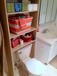 the bathroom is clean and ready to be used as a storage area for toiletries