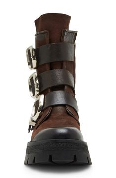 Bring a bit of moto edge to your everyday style in this lug-sole bootie accented with a trio of bold buckle straps. 2 1/4" heel 6 3/4" shaft Side zip closure Leather upper/synthetic lining and sole Imported Lug Sole, Everyday Style, Bootie, Side Zip, Everyday Fashion, Steve Madden, What To Wear, Brown Leather, Leather Upper