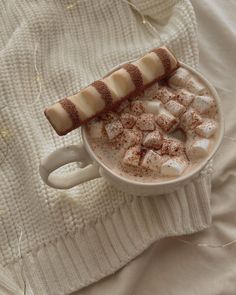 hot chocolate and marshmallows in a white cup