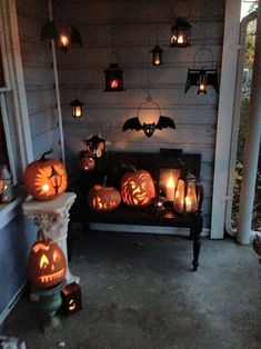 pumpkins lit up on the porch for halloween