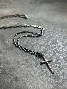 "Cross Necklace Chain Necklace for Men / Women With Black Oxidized Silver Chain | Sterling Silver Mens Necklace | Mens Cross Necklace Unique Solid Sterling Silver cross pendant necklace, a timeless piece of Christian jewelry styled with contemporary aesthetic. Unique Chain features a stylish black oxidized finish that adds depth and character to the design.  Black silver chain features geometric razor blade-shaped links, treated with a charcoal black oxidized finish. The sparkling silver edges add a touch of edginess, revealing the underlying silver color of the necklace. The cross pendant, made in bright sterling silver, beautifully complements the boldness of the chain. The cross chosen for this chain embodies simplicity and elegance, making it a versatile accessory that will stand out o Mens Cross Necklace Silver, Black Sterling Silver Link Chain Necklace, Black Sterling Silver Box Chain Necklace, Black Sterling Silver Link Necklace, Sterling Silver Black Box Chain Necklace, Silver Mens Necklace, Chain Cross Necklace, Chain Necklace For Men, Oxidised Silver Jewelry