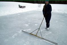 a person standing in the snow with skis and poles