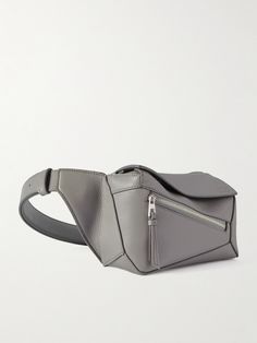 Loewe's belt bag is a bitesize version of its iconic 'Puzzle Edge' design. It's made from panels of smooth leather and lined in herringbone cloth to protect your belongings. The strap is adjustable, so you can wear it around your waist or on the shoulder. Modern Leather Crossbody Belt Bag, Modern Leather Belt Bag, Modern Leather Belt Bag For Business, Modern Soft Leather Pouch Belt Bag, Belt Bag For Men, Loewe Puzzle, Leather Belt Bag, Mr Porter, Belt Bag