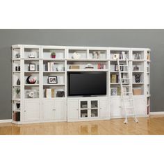 a white entertainment center with shelves and ladder