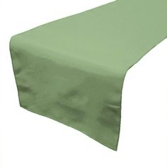 a plain green table cloth on a white background