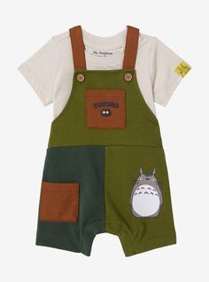 Get your little one ready for an adventure with this My Neighbor Totoro -inspired outfit! Featuring color block legs  the overalls include pockets  a portrait of Totoro  and a puff print Soot Sprite. With an included t-shirt and adjustable straps on the overalls  this outfit is perfect for your kiddo's next walk in the woods. A BoxLunch Exclusive! Glass Milk Carton, Totoro Nursery, Studio Ghibli My Neighbor Totoro, Ghibli My Neighbor Totoro, Baby Bug, Goth Baby, Baby Mine, Neighbor Totoro