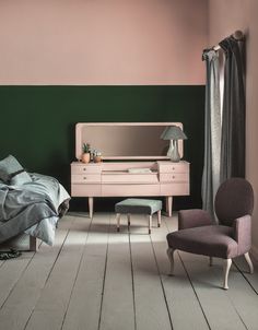 a bedroom with a bed, chair and piano in it