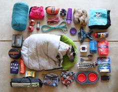 the contents of a sleeping bag laid out on the floor next to it's contents