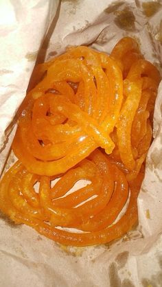 an orange peel sitting on top of wax paper