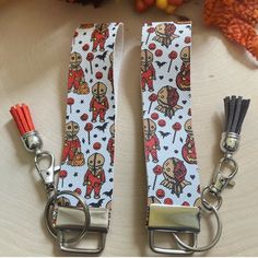 two lanyards with cartoon characters on them