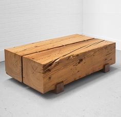 a wooden box sitting on top of a white floor