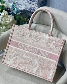 Size: 35 cm, 40 cm Include : Fast Shipping 5 to 7 days delivery Free delivery worldwide at your doorstep Complete box packaging WhatsApp for order or info The Dior tote is a flagship accessory to the House of Dior, and has been coveted for generations. The Dior tote bag embodies functionality and elegance, as it’s designed to carry all of your essentials and be for all your everyday needs. The iconic Dior book tote is embroidered with ‘CHRISTIAN DIOR’ on the front, and can be carried by hand or on your shoulder. Or explore the Diorissimo tote, embellished with sterling silver Dior charms on the handle, made of luxurious material. FOR COSTUME ORDERS AND MORE DETAILS PLEASE CONTACT US ON WHATSAPP. Dior Tote Bag, Dior Purse, House Of Dior, Luxury Bags Collection, Dior Book Tote, Girly Bags, Fancy Bags, Designer Totes, Pretty Bags