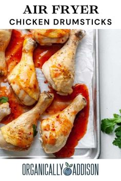 air fryer chicken drums with red sauce and parsley