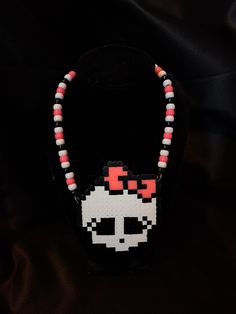 Monster High skullette inspired perler bead necklace. Chain length approximately 23". Silver color chain with lobster clasp. Pet friendly home.  Ships within 3-5 business days.  Color may vary slightly in person vs. Photos. Handmade Emo Style Necklace As Gift, Handmade Emo Style Necklace For Gift, White Rave Jewelry For Gift, Handmade Rave Jewelry For Halloween, Monster High Skullette, Perler Bead Necklace, Scene Necklace, Emo Jewelry, Kandi Inspo