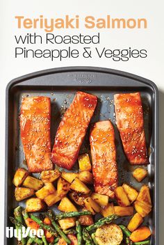 salmon with roasted pineapple and veggies on a pan