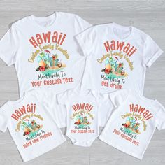 four white shirts with hawaiian designs on the front and back, all printed in different colors