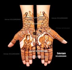 two hands with henna designs on them