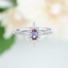 This gorgeous, timeless ring features our favorite alexandrite design and hand picked crystals. ✦ DETAILS ✦ ✧ Handcrafted ✧ 0.75 Carat center stone ✧ Alexandrite and cz crystals ✧ Sizes 2.75-15.25 ✧ Sterling Silver 925 or Rose Gold over Sterling Silver or Gold on Sterling Silver. ✧ This ring will arrive ready to gift in a Kherish Jewelry Pouch. ✧ PRE-ORDER: Items that are preorder only will ship within 10-15 business days. You will receive an email with the updated processing time if you order a White Gold Ruby Ring With Halo For Wedding, Anniversary White Gold Ruby Ring With Halo, Silver Diamond Halo Ruby Ring, Silver-toned Ruby Ring With Halo For Wedding, Silver Ruby Ring With Halo In Fine Jewelry Style, Silver Ruby Ring With Halo Style, Silver Colored Ruby Ring With Halo, Silver Ruby Ring With Halo Design For Anniversary, Wedding Gold Ring