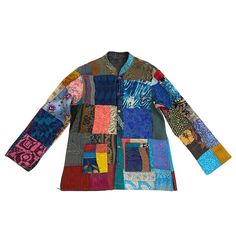 The Audrey Sik Patchwork Jacket by the Blue Door London will be sure to brighten up any outfit and rainy day. The patchwork is full of colorful, vibrant hues and is hand stitched by women artisans using repurposed silk fabric. The Audrey has covered buttons, standing collar, and front pockets to add an elevated touch. This jacket could be framed, it's that beautiful! Multicolor Bohemian Outerwear With Buttons, Bohemian Multicolor Outerwear With Buttons, Artisan Multicolor Long Sleeve Outerwear, Silk Patchwork, Patchwork Jacket, Standing Collar, Blue Door, Women Artisans, Covered Buttons