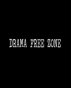 the words drama free zone are white on black