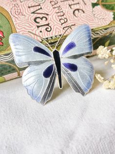 Rare beautiful large 925 silver brooch with blue, violet & gray enamel. A beautiful piece of jewelery from China around 1890-1920 and 100% handmade. Simply gorgeous. Great condition see photos 🦋 Length about 4.3 cm Width about 3.8 cm All items in my shop are sold according to §25a UStG differential taxation. An invoice prepared by Etsy is included with every purchase. If you have any questions about the item, about me personally or about the order, don't hesitate to ask me your questions at any Victorian Silver Enamel Brooches, Silver Victorian Enamel Brooches, Handmade Silver Enamel Pin Collectible, Handmade Silver Enamel Pin For Collectors, Silver Enamel Pin For Wedding, Silver Enamel Wedding Pin, Elegant Blue Butterfly Brooches, Silver Butterfly Brooch For Wedding, Art Nouveau Butterfly