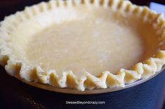 an uncooked pie crust in a bowl