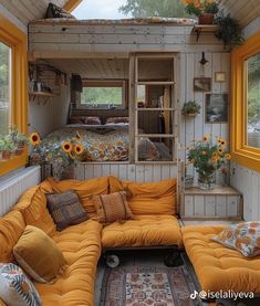 a living room with sunflowers on the windows and a couch in the corner