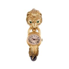 The piece bears French hallmarks and appears to be from the Gay Freres collection, although it is not signed. The lion’s head is artfully carved with beautiful detail and his eyes set with cabochon emeralds. The center is a manual wind watch signed on the dial "Bueche Girod”. The bracelet opens with a single hinge and has an interior diameter of 2.5 by 2 inches. Retro Bracelet, Expensive Jewelry Luxury, Cuff Watch, Expensive Jewelry, Lion Head, The Lion, Watch Sale, Wrist Watches, Carved Wood