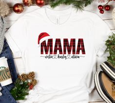 Personalized Mama Claus Christmas shirt with Kid's names, Mom gift for Christmas, mama shirt, mom shirt custom mama shirt, Personalized Mom shirt, Merry mama gift with kids names Please add the names in the personalization box with the color you want to print. You can add any additional text on this design. You can add more kids names. I can send you sample design image to chose the best color or style. Please don't hesitate to contact me. ooooooooooooooooooo Hello, I am Daisy, the owner of  Dai Kids Names, Mama Gifts, Design Image, Christmas Merry, Gift For Christmas, Mama Shirt, Cherished Memories, Mom Shirt, Custom Christmas