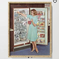 a woman standing in front of an open refrigerator