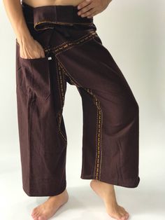 "Unisex Thai fisherman pants. One size fits all. You can wear in many occasions, casual wear, yoga wear, maternity wear, relax at home, travel etc. If you are looking for some pants that you can wear everywhere, comfortable, relax and Easy to wear. Thai fisherman pants is Answer!! Nice gift for yourself or your lover One pocket on the side for storing your items such as wallets, mobile phones, etc Approx. Measurements: One size can fits most and 1 Pockets Measurement Waist 27\" (69 cms) Length 4 Brown Wide-leg Harem Pants With Side Pockets, Brown Wide Leg Harem Pants With Side Pockets, Yoga Pants With Hip Pockets For Yoga, Long Yoga Pants With Hip Pockets, Long Yoga Pants With Hip Pockets For Yoga, Ankle-length Yoga Pants With Pockets, Brown Full Length Yoga Pants, Cotton Yoga Pants For Meditation, Brown Cotton Ankle-length Harem Pants