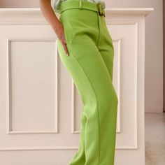 Brand: Folkah. From: Merida, Yucatan.

 Straight-cut pants with side slits at the ankle, side pockets, includes a belt with a tortoiseshell buckle. Slightly flexible fabric composition 97% polyester 3% elastane.

 SIZE GUIDE 














 S

 m

 L






 WAIST CONTOUR

 70

 75

 80






 HIP CONTOUR

 90

 95

 100






 THIGH CONTOUR

 54

 56

 58






 LONG

 105

 105

 105










 -Measurements shown in cm.

 -Measurements of the model (wears size S): bust 80, waist 67, hip 89, h Green High-waisted Wide Leg Work Pants, Green High Waist Wide Leg Pants For Work, Wide Leg Work Pants With Belt, Fitted Trousers With Belted Cuffs, Green Belted Bottoms For Spring, Green High-waisted Pants For Workwear, Green High-waisted Pants For Work, Straight Leg Bottoms With Belt For Work, Fitted High-waisted Pants With Belt Detail