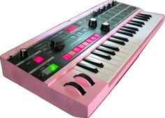 a pink electronic keyboard sitting on top of a white surface with buttons and knobs