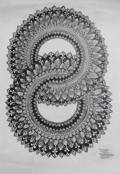 a black and white drawing of an intricate circular design with leaves in the center, on paper