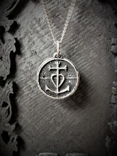 This is a typical cross from France in the region of Camargue, it is also known as the fisherman's cross.Cross is meaning FaithAnchor meaning is the HopeThe hearth mean the virtue of CharityDiameter is 2cm diameterThis cross of Camargue necklace is sold with a stainless steel chainThank you :) Anchor Meaning, Pentagram Necklace, A Typical, Handmade Pendant, Antique Finish, Handmade Pendants, Surprise Gifts, Stainless Steel Chain, Cross Pendant