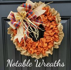 an orange and tan burluck wreath with the words not able wreaths on it