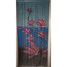 a painting on the side of a door that has flowers painted on it with bamboo blinds