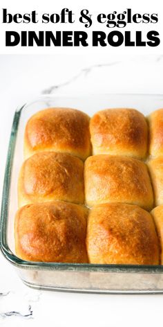 soft and eggless dinner rolls in a glass baking dish with text overlay that reads soft & eggless dinner rolls