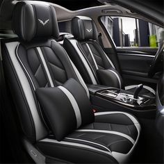 the interior of a car with black and blue seats