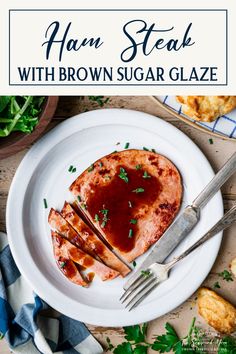 ham steak with brown sugar glaze on a white plate