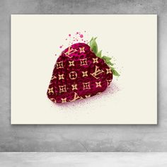 a strawberry with louis vuitton letters on it